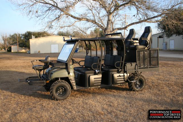 above) This is a Polaris Ranger Crew with dog cages, high seat, front quail...